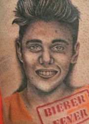 40 прекрасных и ужасающих татуировок в виде знаменитостей